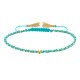 Bracelet Lien Tréssé Rond Bicolore Lurex Doré et Une Perle Or 14 Carats